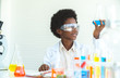 © tool51 - African black boy thinking Formula science idea and inspiration  innovation technology of world in educatio