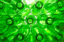 Glass Beer Bottles Lie In Rows, Necks On Camera