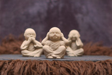 Priests Meditation; Buddhist Monks Closeup Of Toy Figures I Saw Nothing, I Heard Nothing, I Said Nothing Sculpture