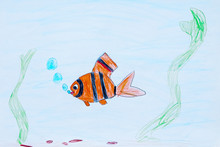 Child's Drawing Of Fish Under The Sea On White Sheet Of Paper.