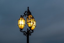 Historical Lamp Post In Valletta, Malta With Three Bulbs, One Of Them Is Broken