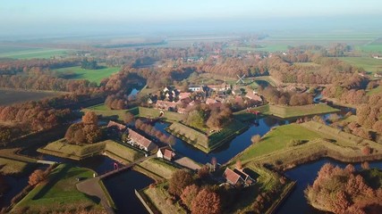 Wall Mural - Flight over Fortified Town of Bourtange in the Netherlands in autumn colours