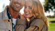 © Svitlana - Happy moments. Close up portrait of beautiful romantic couple smiling and embracing while standing in the park