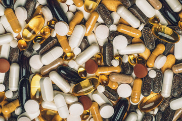 Wall Mural - Medication background with many pills, capsules and dietary supplements, top view.