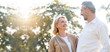 © Rapeepat - Senior Caucasian couple hugging in park. Family with a happy smile feels relaxed with nature in the morning. Or in the evening. Enter elderly society And retire from work. Concept health insurance