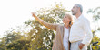 © Rapeepat - Senior Caucasian couple hugging in park. Family with a happy smile feels relaxed with nature in the morning. Or in the evening. Enter elderly society And retire from work. Concept health insurance