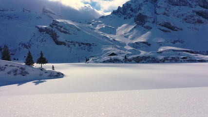 Fantastically beautiful snow landscape in the mountains - aerial flight footage - aerial photography