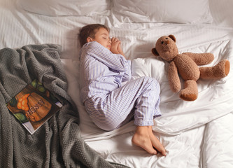 Wall Mural - Cute little boy sleeping in bed