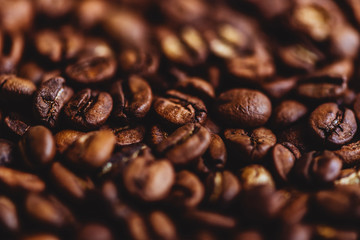 Coffee grains. Background of roasted coffee beans brown. layout. Flat lay.