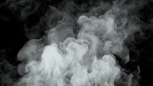 White Water Vapor Steam On A Black Background. Realistic Dry Smoke Clouds Fog Overlay. Simply Drop It In And Change Its Blending Mode To Screen Or Add.