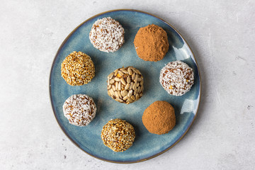 Homemade energy balls of dried fruits, nuts and oatmeal. Top view.