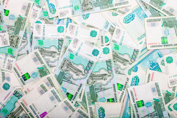 Poster - a bunch of 1000 ruble banknotes.