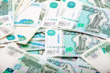 Poster - a bunch of 1000 ruble banknotes.