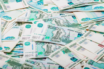 Poster - a bunch of 1000 ruble banknotes.