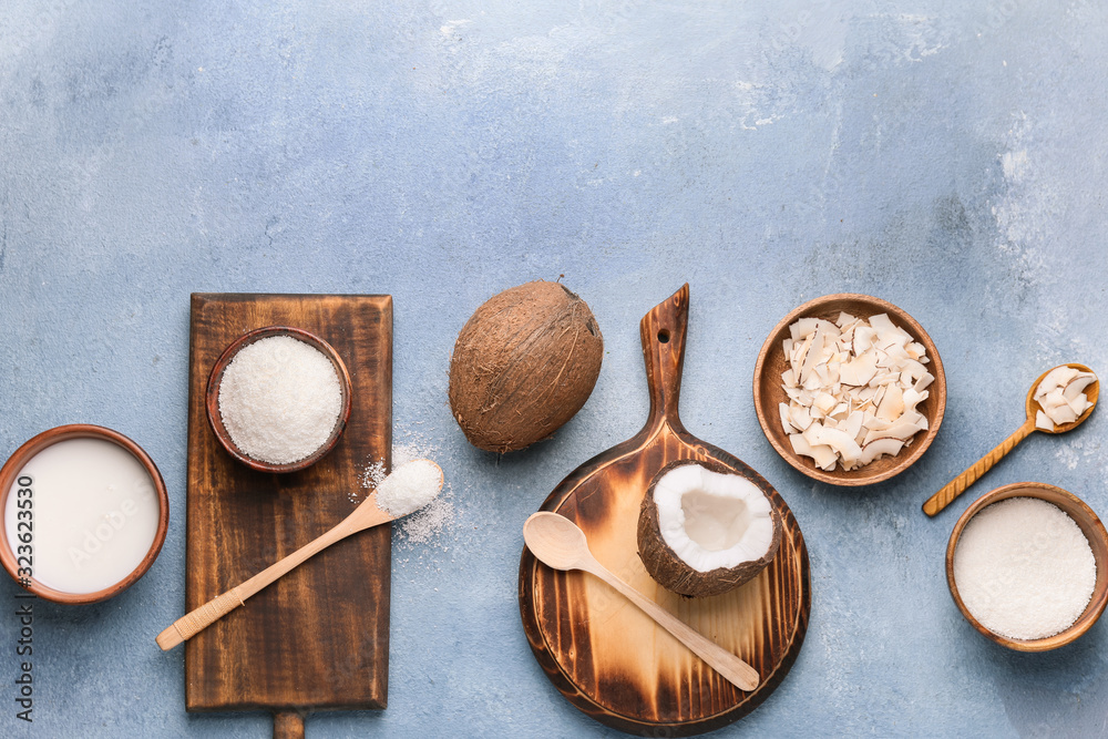 Composition with different coconut products on color background