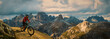 Cycling outdoor adventure. Man cycling on electric bike, rides mountain trail. Man riding on bike in Dolomites mountains landscape. Cycling e-mtb enduro trail track. Outdoor sport activity.
