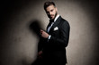 © Viorel Sima - sexy elegant young model in tuxedo holding hand in a fashion pose