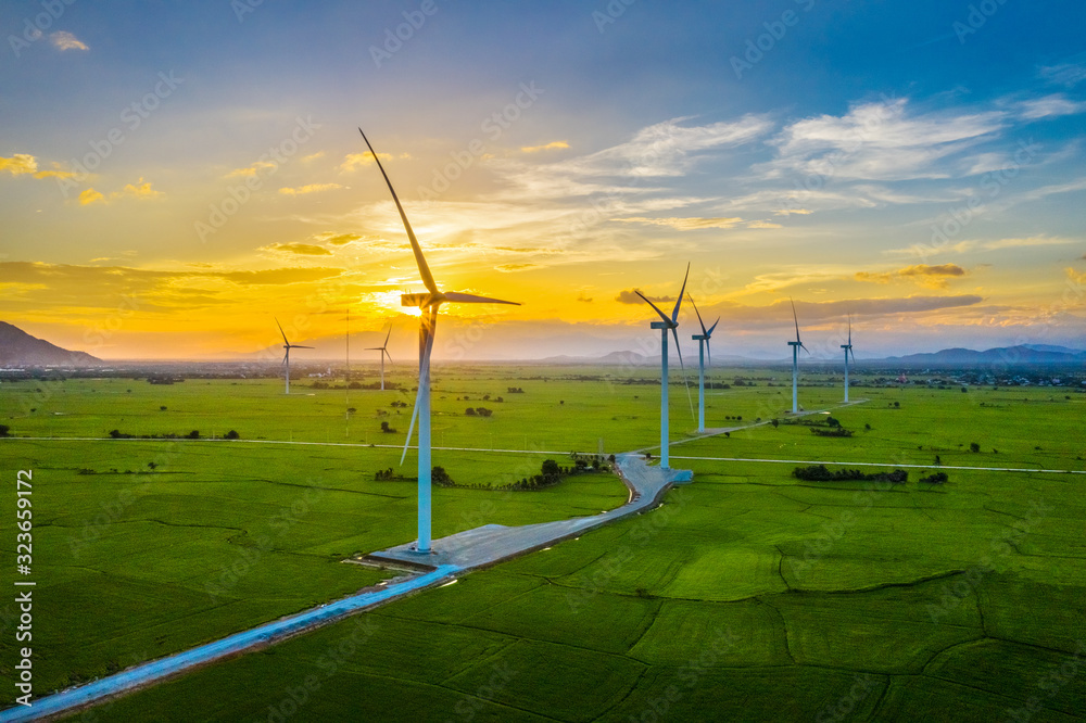 Landscape with Turbine Green Energy Electricity, Windmill for electric power production, Wind turbines generating electricity on rice field at Phan Rang, Ninh Thuan, Vietnam. Clean energy concept. - obrazy, fototapety, plakaty 