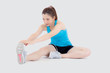 © NT_studio - Beautiful portrait young asian woman fitness with stretching leg isolated on white background, asia girl workout with full body exercise and warm up, body care and healthy concept.