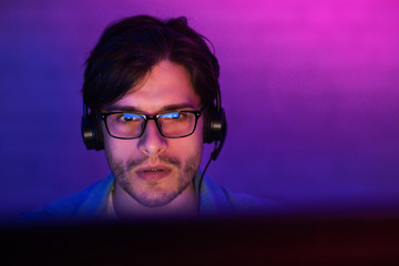Aufkleber - Gamer At Desktop PC Playing Game At Home At Night