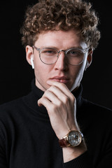 Poster - Close up of a handsome confident young curly haired businessman