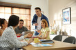© New Africa - Team of professional designers working in office