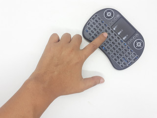 Modern Artistic Black TV Remote with QWERTY Keypad and Game Tools in White Isolated Background