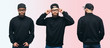 Handsome hipster guy with beard wearing black blank hoody or sweatshirt from front and back and black cap with space for your logo or design on white background. Mockup for print
