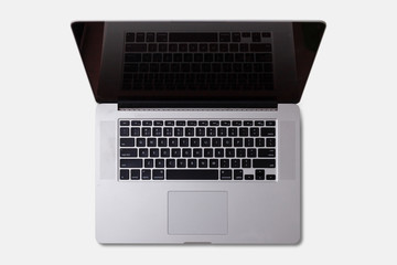 Isolated laptop with empty space on white background Top view. Flat lay style.