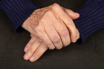 Canvas Print - Wrinkled elderly hands