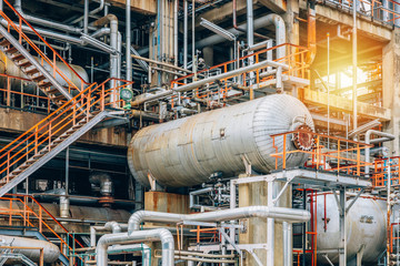 Industrial zone,The equipment of oil refining,Close-up of industrial pipelines of an oil-refinery plant,Detail of oil pipeline with valves in large oil refinery.