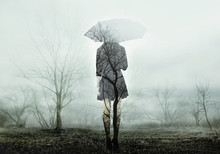 Girl With Umbrella Standing On The Field With Trees. Rain. Loneliness. The Image With The Effect Of Double Exposure