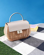 © Will Anderson - Straw basket purse on picnic blanket