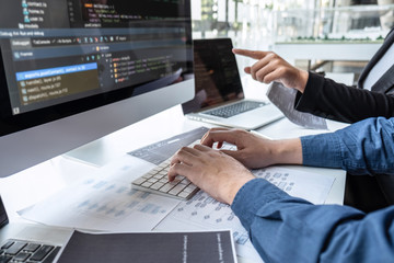 professional team of programmer working on project in software development computer in it company of