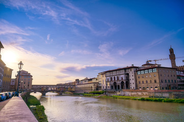 Wall Mural - A view along the Arno River towards the Ponte Vecchio in Florence, Italy.