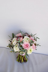 Wall Mural - Wedding flowers, bridal bouquet closeup. Decoration made of roses, peonies and decorative plants, close-up, selective focus, nobody, objects. copy space