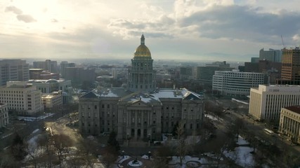 Wall Mural - 4k Aerial drone footage - Colorado State Capitol Building & the Skyline of the City of Denver Colorado at Sunset.  