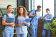 © Pixel-Shot - Group of medical students in corridor of modern clinic