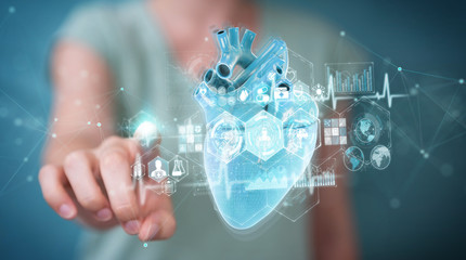 Poster - Woman using digital x-ray of human heart holographic scan projection 3D rendering