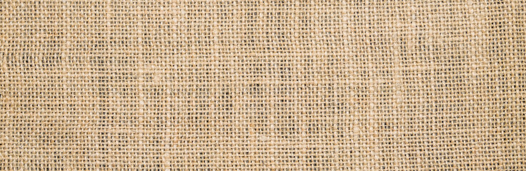 Wall Mural - Hessian sackcloth burlap woven texture background/cotton woven fabric background with flecks of varying colors of beige and brown. with copy space. office desk concept. Hessian sackcloth burlap woven.