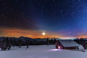 Wall Mural - a bright starry night in the mountains with the milky way in the sky, venus and millions of stars hi