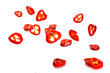 Chili pepper and its slices close-up falling