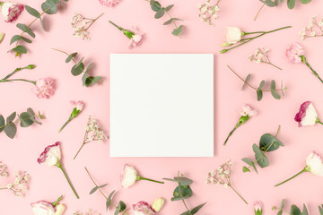 Wall Mural - square paper card mockup. floral pattern on a pink background.