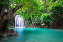 Waterfall In Tropical Forest At Erawan Waterfall National Park, Thailand	