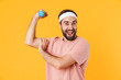 © Drobot Dean - Image of muscular athletic young man having fun and lifting dumbbell