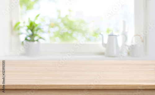 Cuadros en Lienzo Wooden kitchen table with background of window for product display