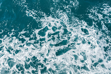 Blue water in the ocean or in the sea. Turquoise waves and Aqua Mente and Phantom Blue. Photos for wallpaper or for background. Abstraction of the waves. Thailand