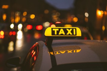 Poster - Taxi sign on car during night