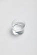 © LIGHTFIELD STUDIOS - transparent glass of fresh water on white surface