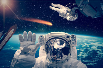 Wall Mural - different spaceships above the earth. austronauts in outer space. the elements of this image furnish